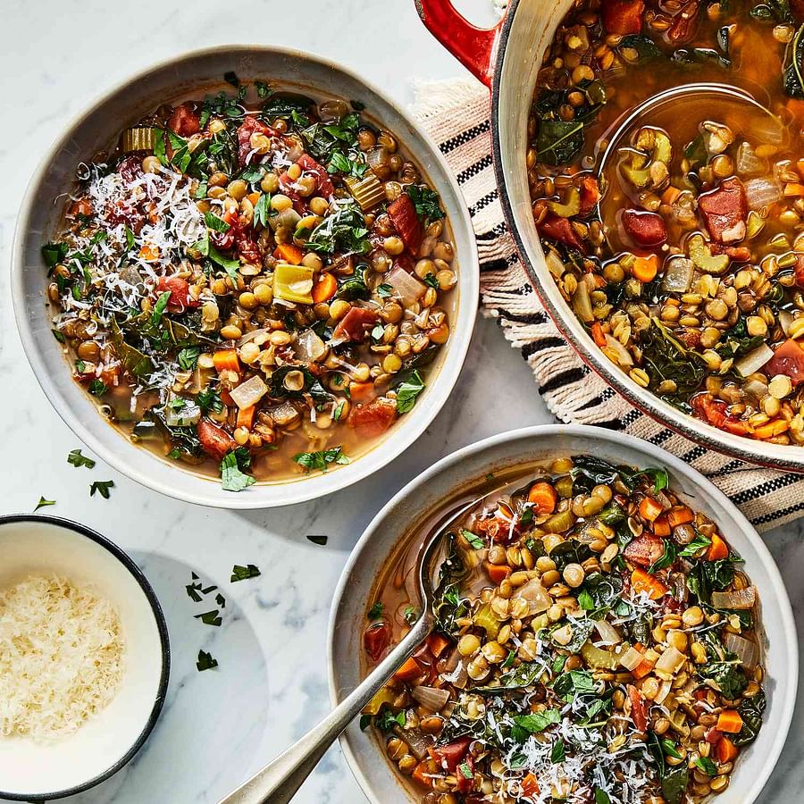 Delicious and hearty one-pot lentil and vegetable stew served in a bowl