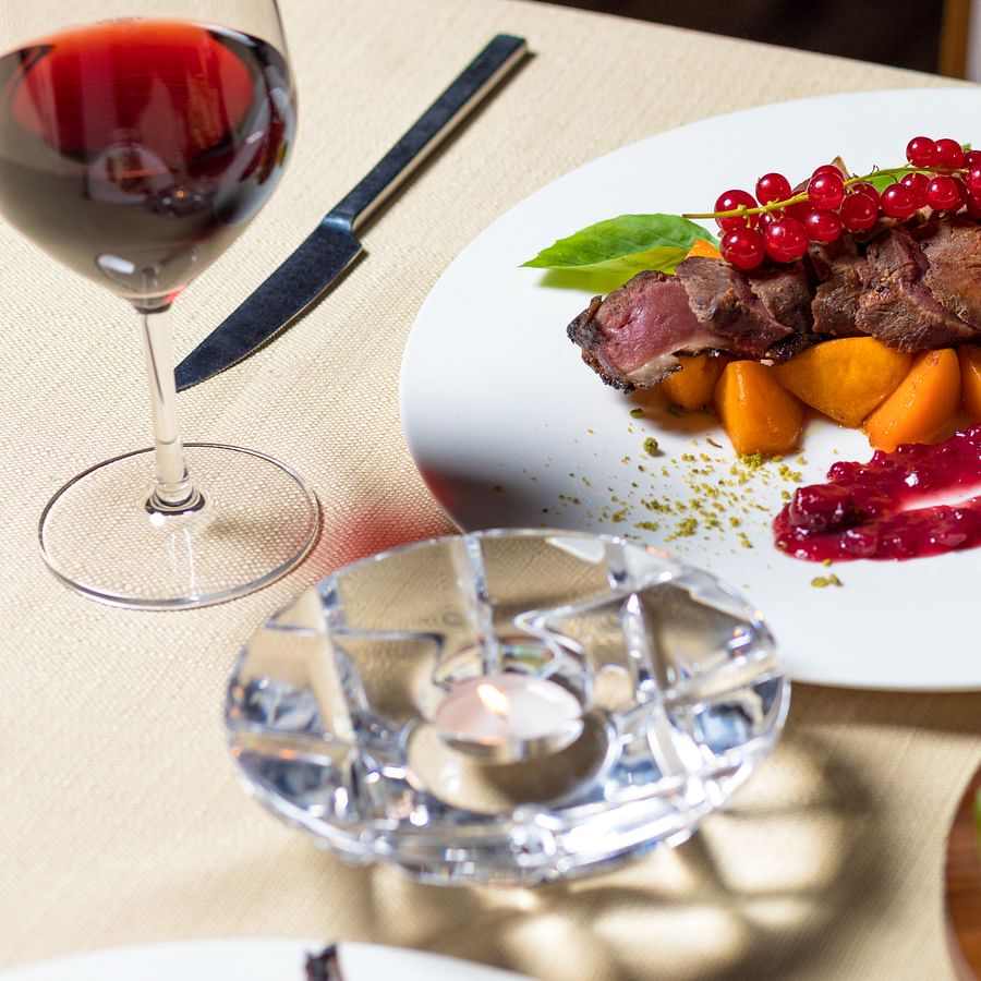 Campers pre-cooking, portioning, and packing food for their camping trip